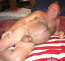Maduro daddy bear relaxing in bed