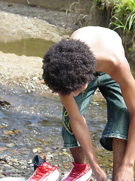 image of boy playing with penis